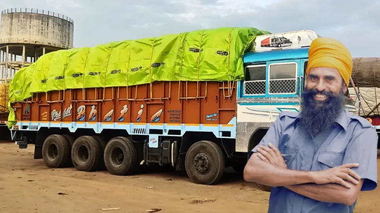 Content truck owner standing by their truck equipped with a durable tarpaulin, emphasizing its role in protecting the truck's load from the elements.